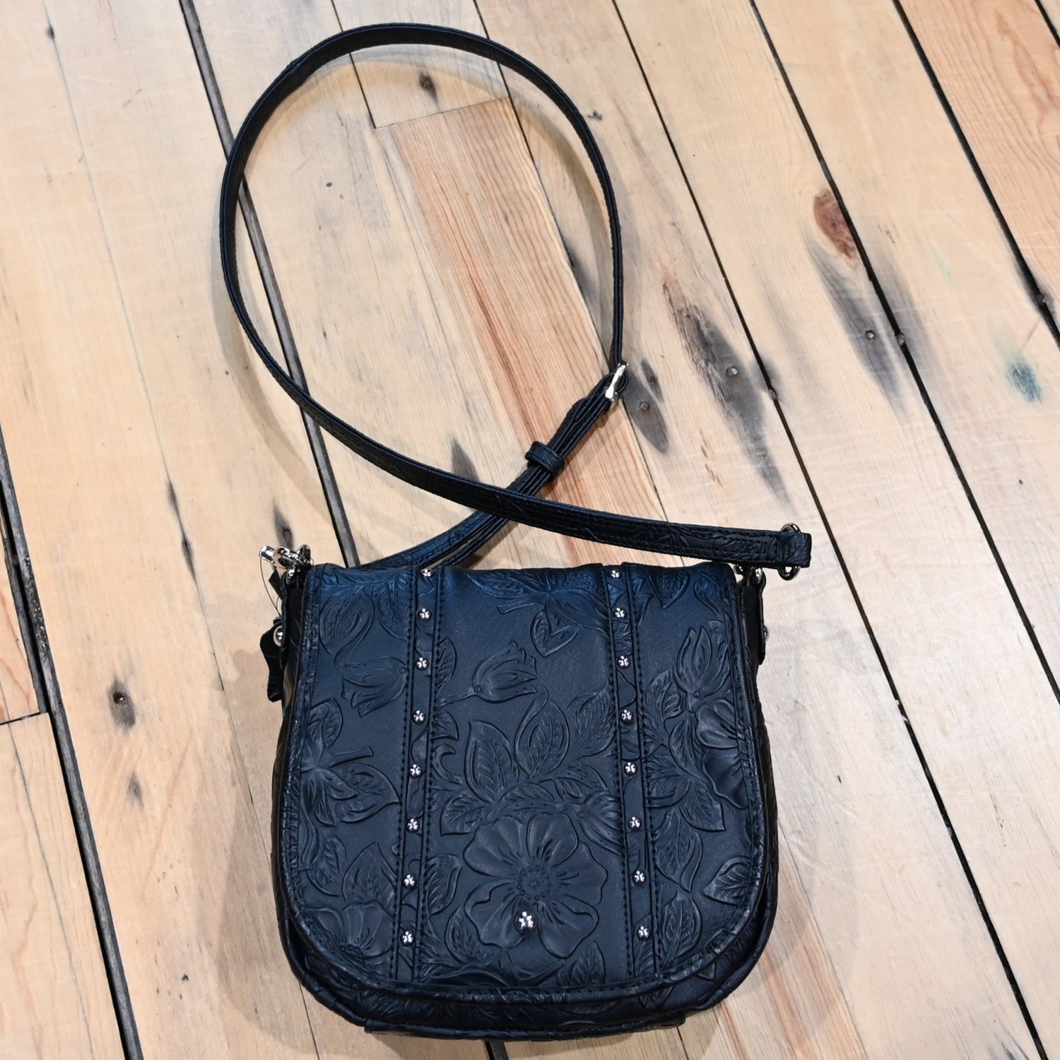 Gun Toten Mamas black studded flap conceal carry bag with embossed rose-leaf tooling