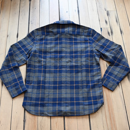 View of Pendleton men’s Burnside flannel shirt in navy and khaki plaid with square hem