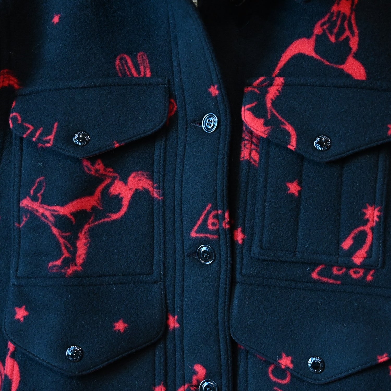 Filson Ladies Jacquard Wool Cruiser Jacket in Black and Red Western pattern with button front and utility pockets