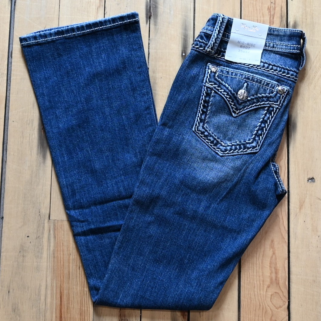 Miss Me Mid Rise Boot Cut Ladies Jean with boot cut leg and embroidered back pockets
